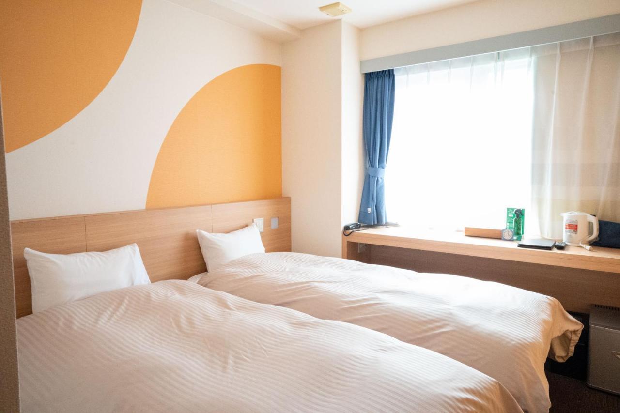 Hotel Raffinato Chitose Титосе Екстериор снимка