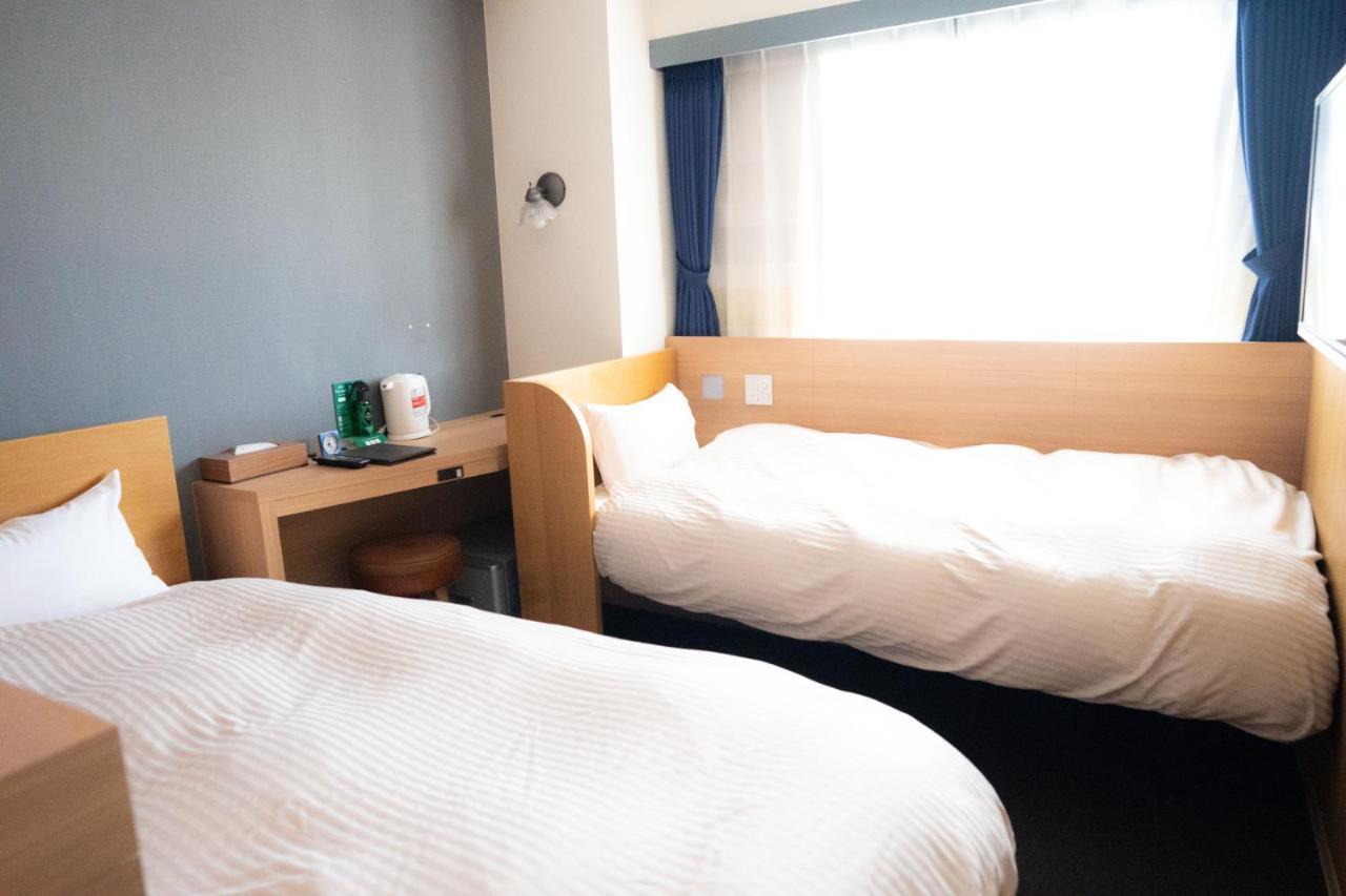 Hotel Raffinato Chitose Титосе Екстериор снимка